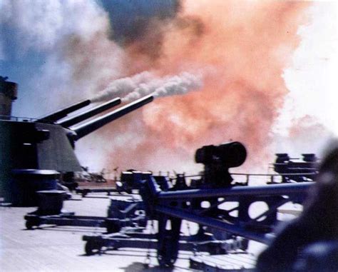 Battleship USS North Carolina firing her after 16-inch guns during her shakedown cruise, 28-29 ...