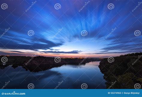 Beautiful Night Sky At The River With Stars And Clouds Stock Image