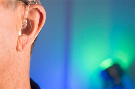 Premium Photo Close Up Of Man Wearing Hearing Aid