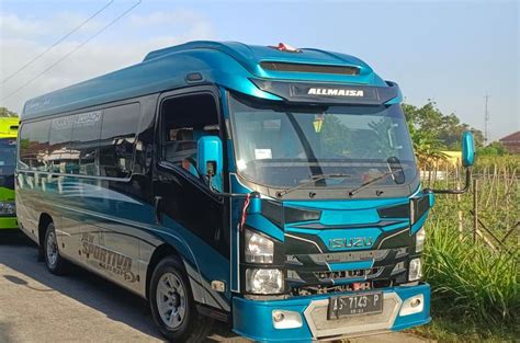 sewa kendaraan mobilelf long  seat