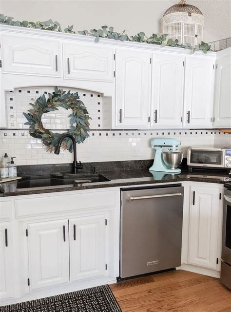 6 Faux Eucalyptus Garland Curated On LTK Above Kitchen Cabinets