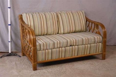 Rattan loveseat with striped fabric; 13024-665 - R.H. Lee & Co. Auctioneers