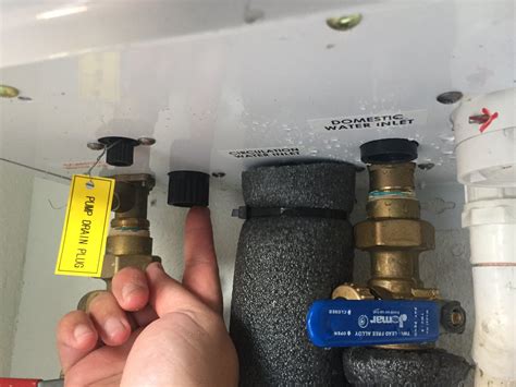 How To Flush A Tankless Water Heater And Clean The Air Intake Filter 7 Steps With Pictures