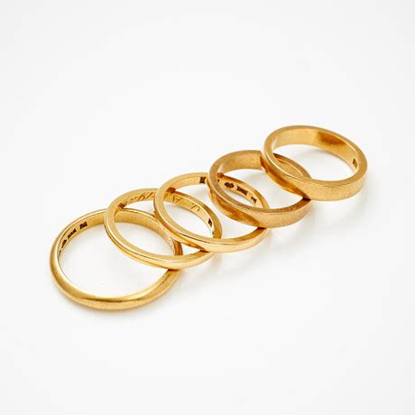 VIGSELRINGAR 5 st 18 k guld Smycken Ädelstenar Ringar Auctionet