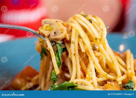 Spaghetti With Spicy Mixed Mushroom And Basilthai Fusion Food Stock