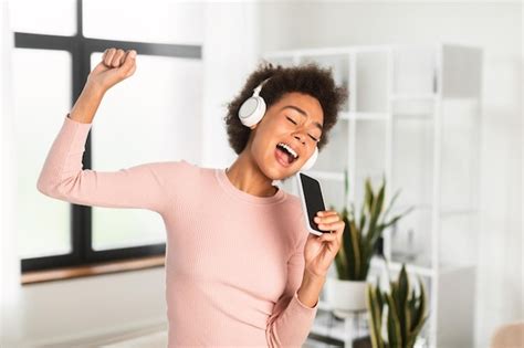 Premium Photo Glad Millennial African American Lady In Wireless