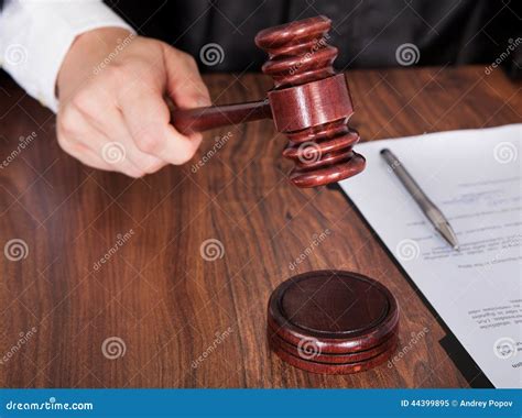 Male Judge Striking The Gavel Stock Image Image Of Auction Authority