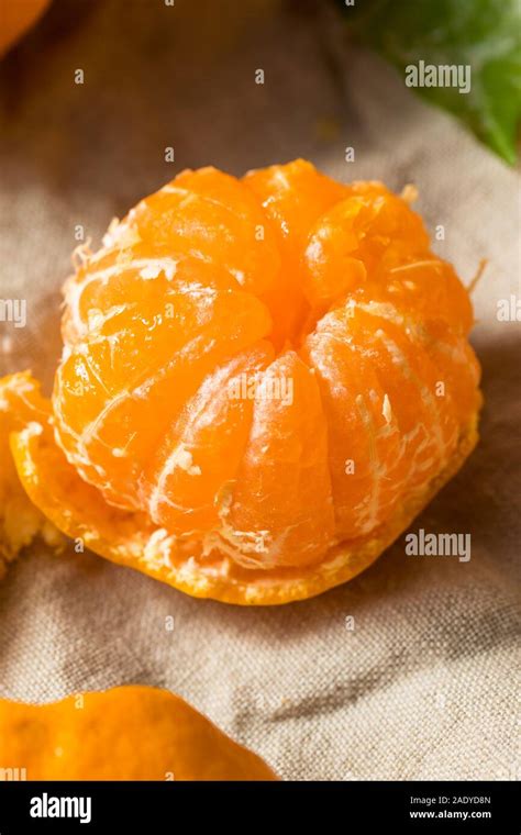 Raw Orange Organic Mandarins With Green Leaves Stock Photo Alamy