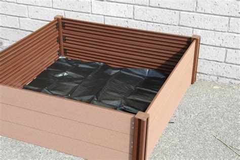 raised-garden-bed-weed-mat | Holman Industries