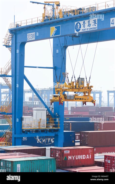 A view of the fully automated container terminal at the Port of Qingdao in Qingdao city, east ...