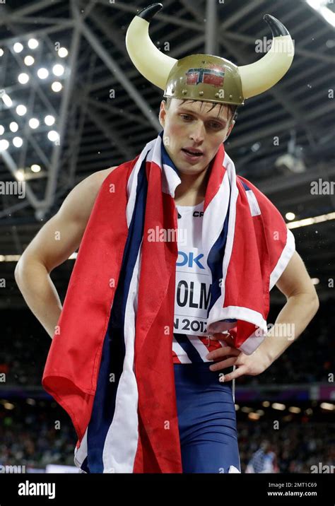 Norway S Karsten Warholm Wears A Viking Helmet Celebrates After Winning