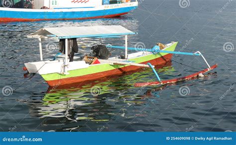 A Small Traditional Fishing Boat Docked At The Fishing Port Editorial