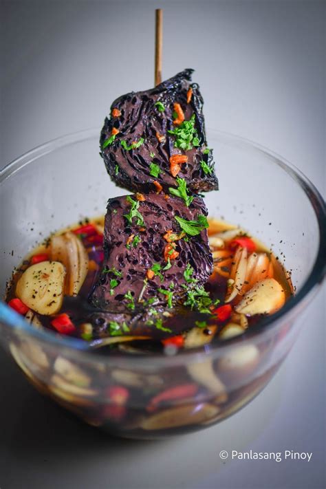 A Bowl Filled With Food And A Toothpick Sticking Out Of Its Top