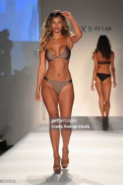 A Model Walks The Runway During The Swimmiami Prey Swim By Audrina