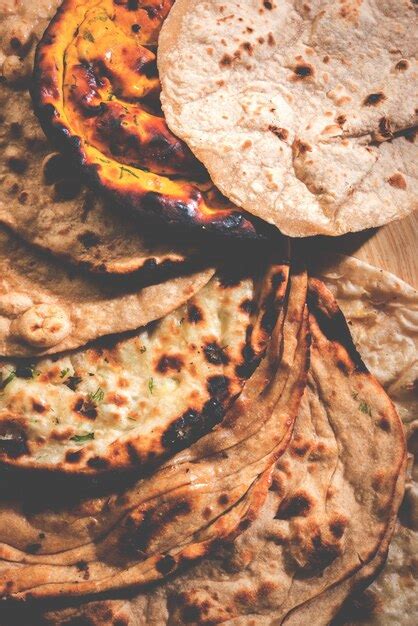 Premium Photo Assorted Indian Bread Basket Includes Chapati Tandoori