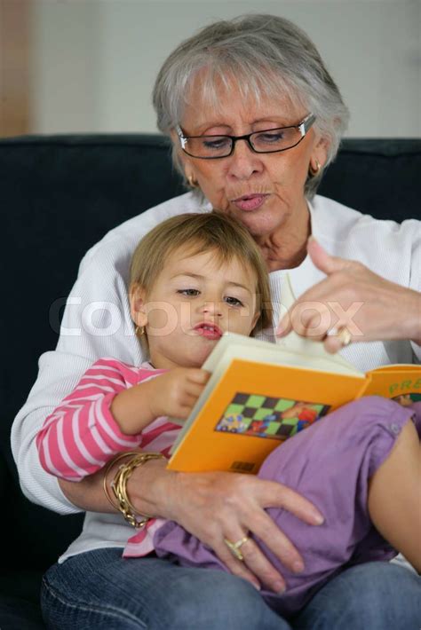 Grandma And Child Reading Together Stock Image Colourbox