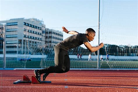 "Black Man Running Fast On Stadium" by Stocksy Contributor "Javier Díez ...