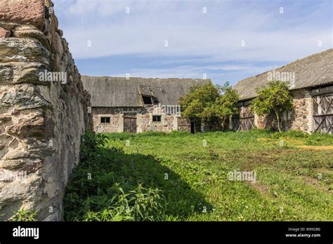 The farmyard is an agricultural abandoned farm. The old collapsed barns ...