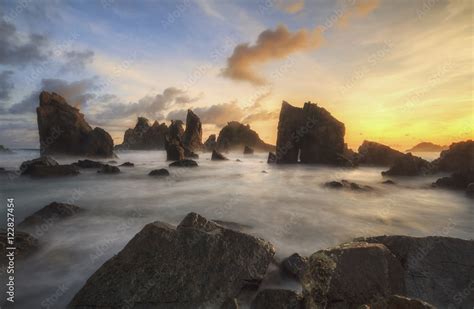 Beautiful scenery stones at beach in sunset. Locations in Pegadung ...