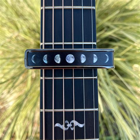 Thalia Black Chrome Finish Capo Moon Phases On Pearl Mojos Music