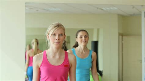 cheerful aerobics instructor holding training session Stock Footage ...