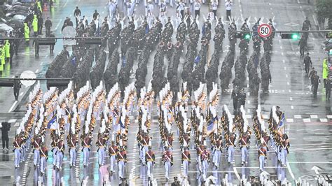 South Korea flexes military muscle with parade, issues dire warning ...