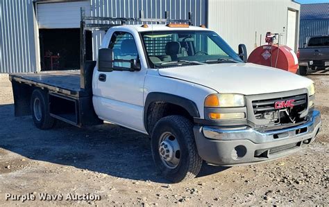 2004 Gmc Sierra 3500 Flatbed Pickup Truck In Grain Valley Mo Item Dr7981 For Sale Purple Wave