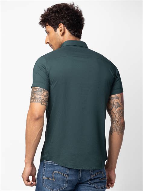 Spykar Men Bottle Green Cotton Slim Fit Plain Shirt