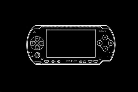 Download PSP Gaming Console on Wooden Table | Wallpapers.com