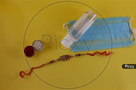 Image Of Rakhi Raksha Bandhan Sanitizer With Mask Ei191978 Picxy