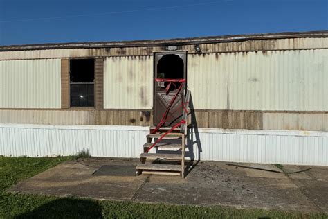 House Catches Fire In Clarksville Man Found Dead From Gunshot After