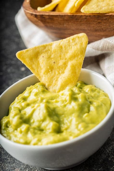 Corn Nacho Chips And Avocado Dip Yellow Tortilla Chips And Guacamole