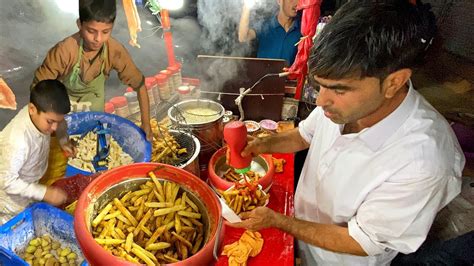 8 Years Old Kid With Father Making Crispy French Fries Perfect French