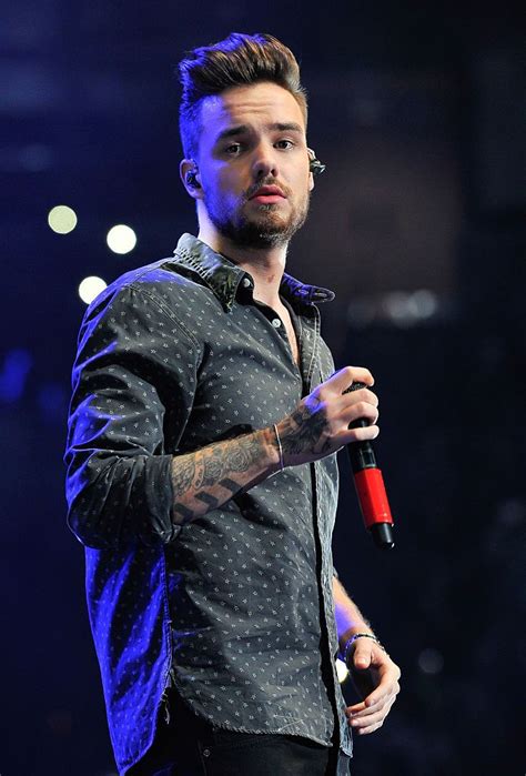 Liam Payne of One Direction performs at the 99.7 NOW! Triple Ho show ...