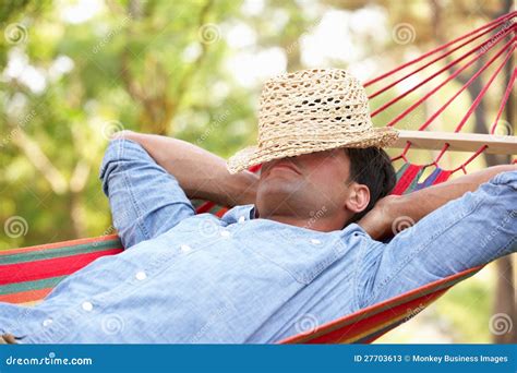 Man Relaxing In Hammock Stock Photos Image 27703613