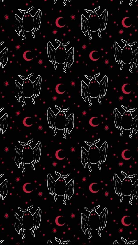 A Black Background With Red And White Bats Stars And Crescents On It