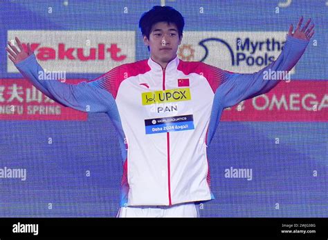 Zhanle Pan Of China Celebrates At The Podium After Winning Gold Medal