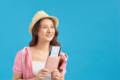 Premium Photo Portrait Of Young Asian Woman Holding Passport And Smile Happy People And