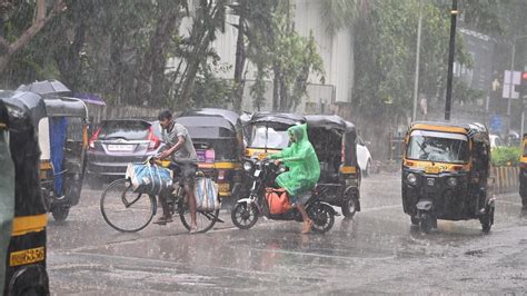 In Photos Mumbai Witnesses Moderate Rains In Parts Of City