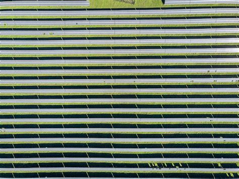 Premium Photo Aerial View Of Many Panels Of Solar Cells In A Row On