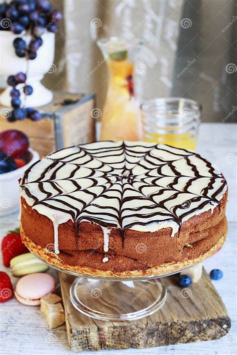 Halloween Chocolate Spider Web Cake And Various Fruits Around Stock