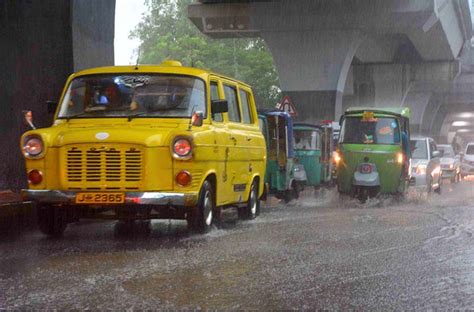 Commuters Traveling During Heavy Rainfall