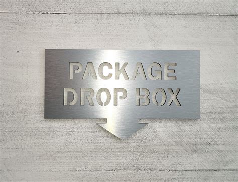 Package drop box sign with arrow. Please leave packages in the box sign ...