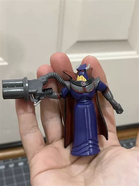 TOY STORY 2 Disney Pixar Evil Emperor ZURG Avec PISTOLET MINI Figurine