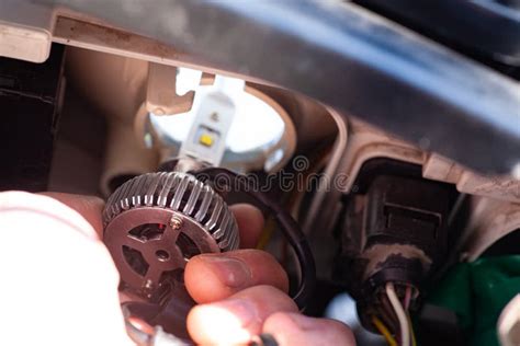 Hand Installing H7 Led Headlight Bulb with Wires. Stock Image - Image ...