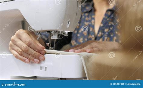 Seamstress At Work On A Sewing Machine Close Up Stock Image Image Of