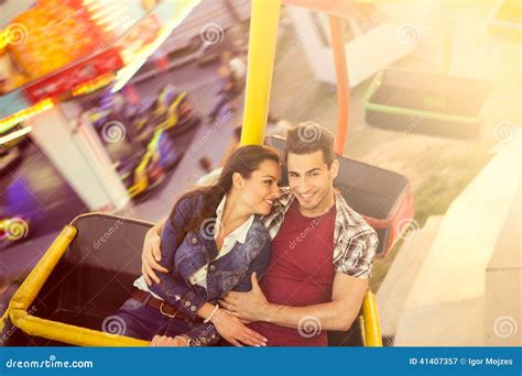 Young Couple Having a Ride on a Ferris Wheel Stock Image - Image of ...