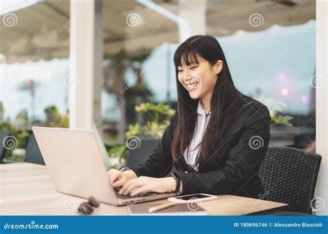 Business Asian Woman Working On Computer Outdoor Happy Chinese Girl