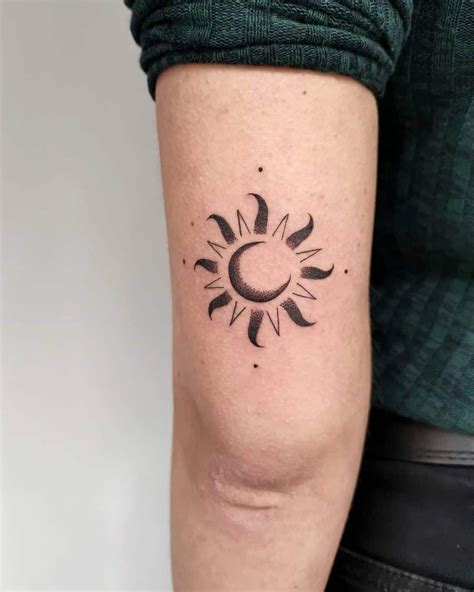 Sun Inside Moon Tattoo