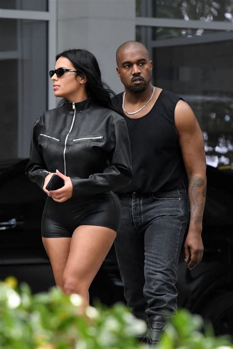 Kanye West And Chaney Jones Wear All Black With Tall Black Boots